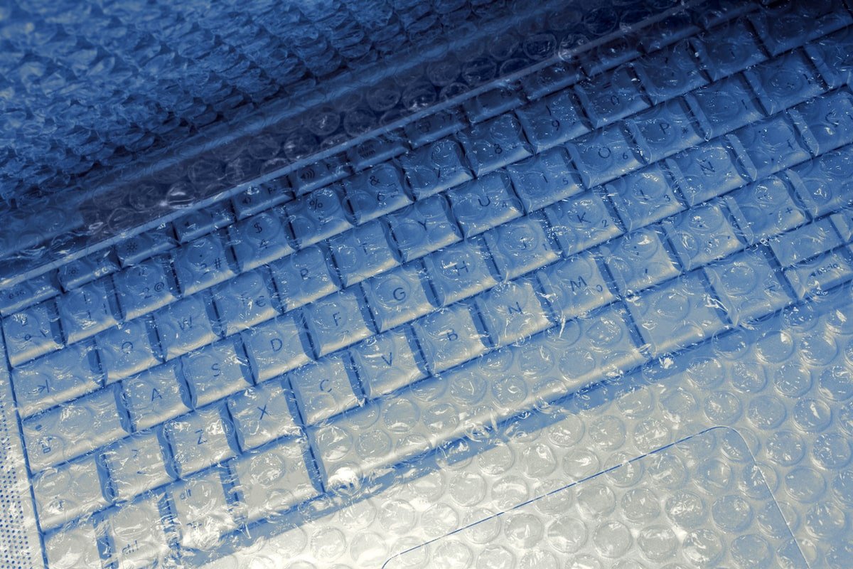 laptop in bubble wrap